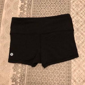 Black lululemon reversible spandex shorts - size 4